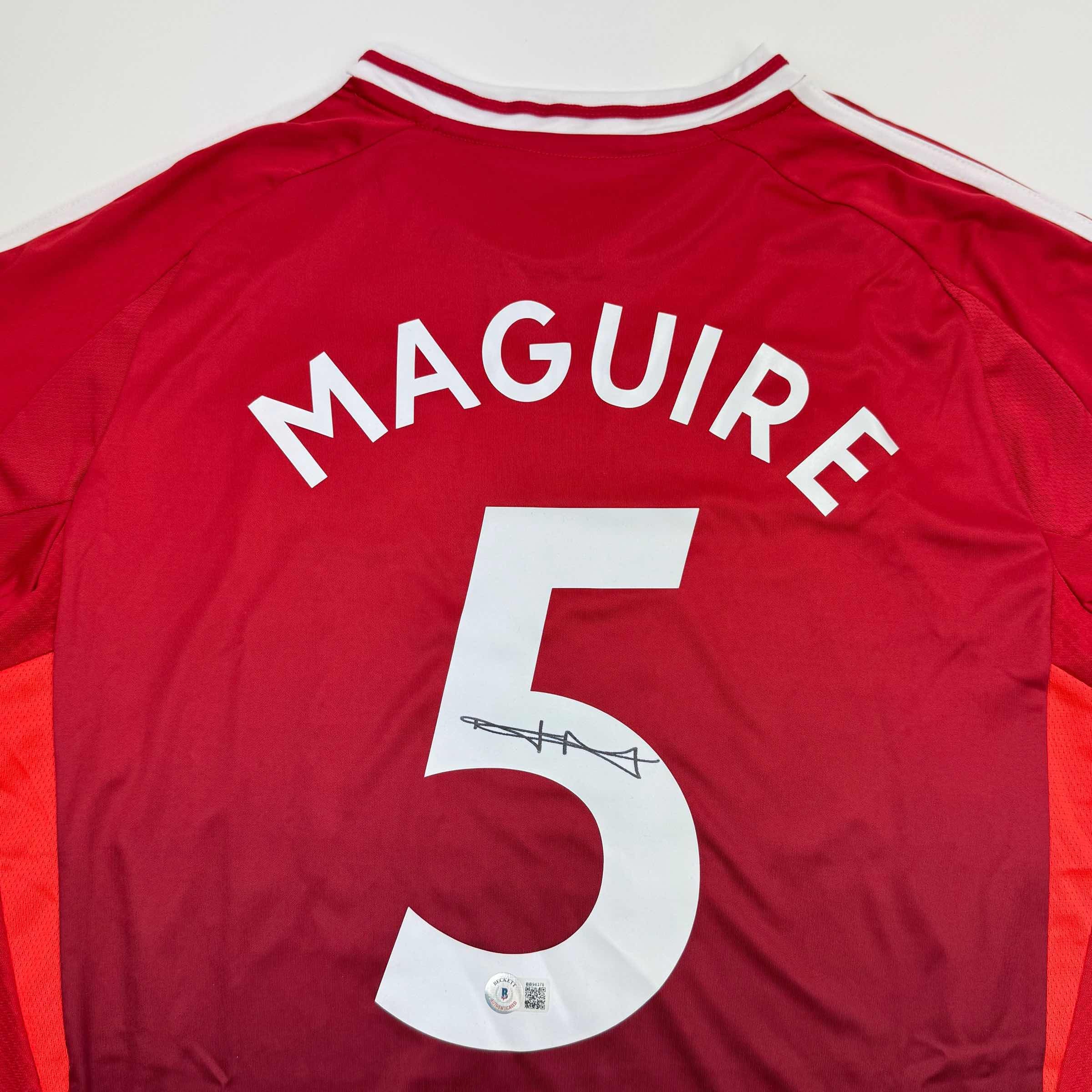 Autographed/Signed Harry Maguire Manchester United Red Soccer Jersey Beckett BAS COA