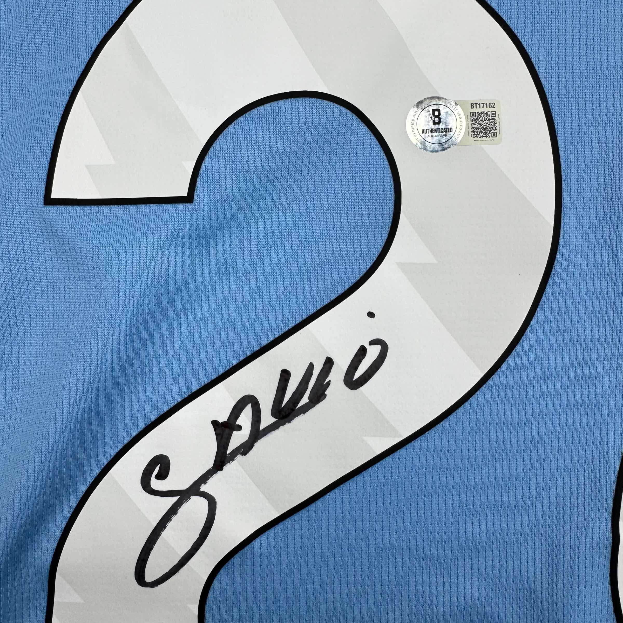 Autographed/Signed Savinho Manchester City Blue Soccer Futbol Jersey Beckett BAS COA